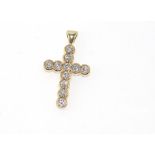 9ct yellow gold and diamond cross 11 diamond TDW=0.60 cts H/Si 1, weight: approx 1.6 grams, size: