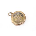 Vintage 9ct gold round locket engraved with flowers, weight: approx 2.96 grams