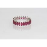 18ct white gold and ruby eternity ring 2.8ct treated ruby, weight: approx 2.8 grams, size: N-O/7