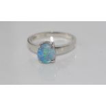 18ct white gold and solid boulder opal ring weight: approx 2.65 grams, size: O/7