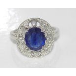 18ct white gold, sapphire & diamond ring 12 diamonds, treated sapphire 2.59ct, weight: approx 3.