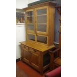 Pine kitchen dresser with 4 glass doors above 2 drawers and 2 lower drawers, 121cm wide, 205cm high
