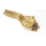 Ladies 18ct yellow gold Rolex wristwatch with 18ct yellow gold band, total weight: approx 66.68