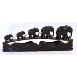 Oriental carved timber elephant figure group 37cm wide approx.