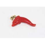 Red coral pendant/charm in form of a dolphin with 9ct bale