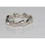 18ct white gold and diamond eternity style ring with 16 brilliant cut diamonds 0.12cts and 45