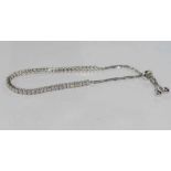 18ct white gold and diamond bracelet with tassel, 48 diamond, TDW=1.44ct, weight: approx 7.07 GRAMS