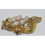 Gilt metal brooch with 5 solid opals in bow form