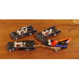 Three Corgi Toys Batmobiles and a Batboat with trailer