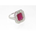 18ct white gold, ruby and diamond ring 26 diamonds, treated ruby 4.56ct, weight: approx 4.7 grams,