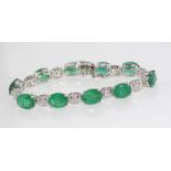 Superb platinum, natural emerald &diamond bracelet 10 oval cut emeralds 28.97cts, diamonds TDW= 1.