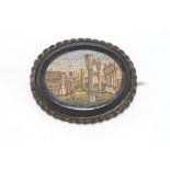 Antique Italian micro-mosaic and onyx brooch size: approx 4.5 by 3.5 cm