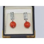 18ct white gold, diamond and coral earrings 8 claw set diamonds, for pierced ears, weight: approx