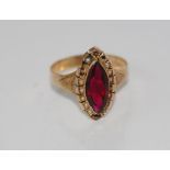 14ct yellow gold ring set with red glass stone weight: 1.9 grams, size: Q-R/8, as inspected