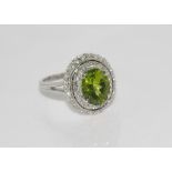 18ct white gold diamond & peridot dress ring with double diamond cluster, weight: approx 5.2