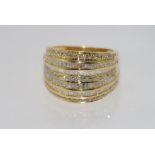 18ct yellow gold and multi-diamond ring with approx 1.38ct tapered diamonds and 0.5ct other