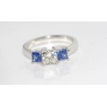 18ct white gold diamond & Ceylon sapphire ring Princess cut diamond, H/I VS and 2 Carre Ceylon