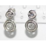 18ct white gold and diamond trembler earrings weight: 5.13 grams