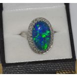 18ct white gold, solid black opal and diamond ring weight: approx 8.74 grams, size: R-S/8-9