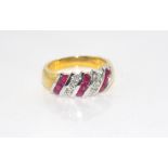 18ct yellow gold ruby & diamond ring with 9 Burmese rubies and 6 diamonds diagonally set, weight: