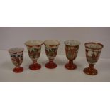 Five Japanese Kutani saki cups 8 cm high approx.