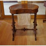 Victorian walnut kidney shaped sewing table with drawer and fabric storage well, 62cm wide, 38cm