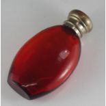 Antique ruby glass scent bottle with silver plated lid