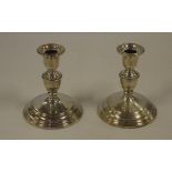 Pair of sterling silver candlesticks 13 cm high