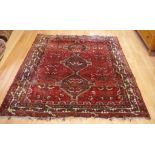 Persian hand made wool rug with red tones, 200cm x 164cm approx