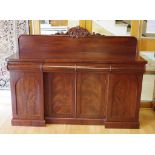 Victorian mahogany sideboard with 3 drawers and 4 doors opening to inside drawers, shelves and a