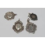 Three various hallmarked silver medallions together with another smaller medallion