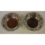 Two antique style silver plated bottle coasters by Strachan