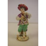 Small antique Miessen figure of a Musician playing recorder.