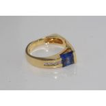 14ct yellow gold, tanzanite and diamond ring in an asymmetric style, weight: approx 5.2 grams, size: