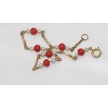 9ct yellow gold, coral and pearl bracelet weight: approx 3.55 grams