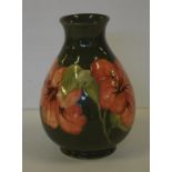 Moorcroft 'Hibiscus' vase impressed marks, signature and paper sticker to base, 21cm high approx