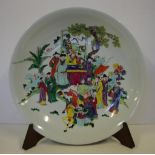 Large oriental charger with handpainted figural group, with timber stand, 48cm diameter approx.