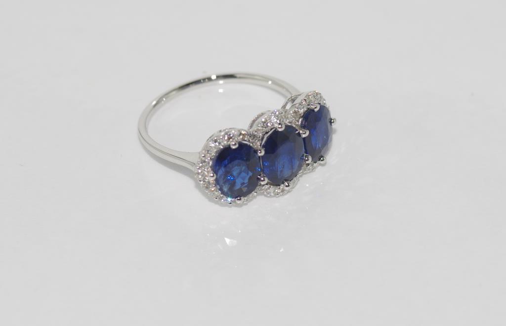 18ct white gold 3 sapphire and diamond ring untreated Burmese sapphires = 3.443ct, 32 diamonds = 0. - Image 2 of 2