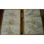 Twelve antique handpainted porcelain Chinese tiles depicting scenes of animals and flowering