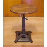 Vintage Singer machine operator stool with cast iron base and wooden seat, 54cm high approx