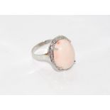 18ct white gold, pink coral and diamond ring weight: approx 6.93 grams, size: P-Q.8