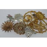 Various vintage brooches and costume jewellery including two signed star brooches, two vintage