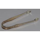 George III sterling silver bright sugar tongs hallmarked London 1805, maker GW