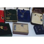 Seven boxed jewellery sets