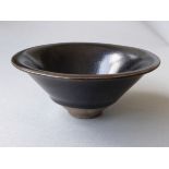 A Chinese late Song Dynasty (960-1279) black glaze tea bowl c1200 H6cm D13.2cm