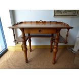 A Victorian mahogany hall table above stretchered shaped reeded and fluted supports H70cm W90cm