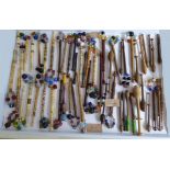 a C19th Collection of treen and bone carved lace bobbins