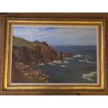 An oil on canvas signed 'H Gibbs 1909' Seascape with cliffs and lighthouse