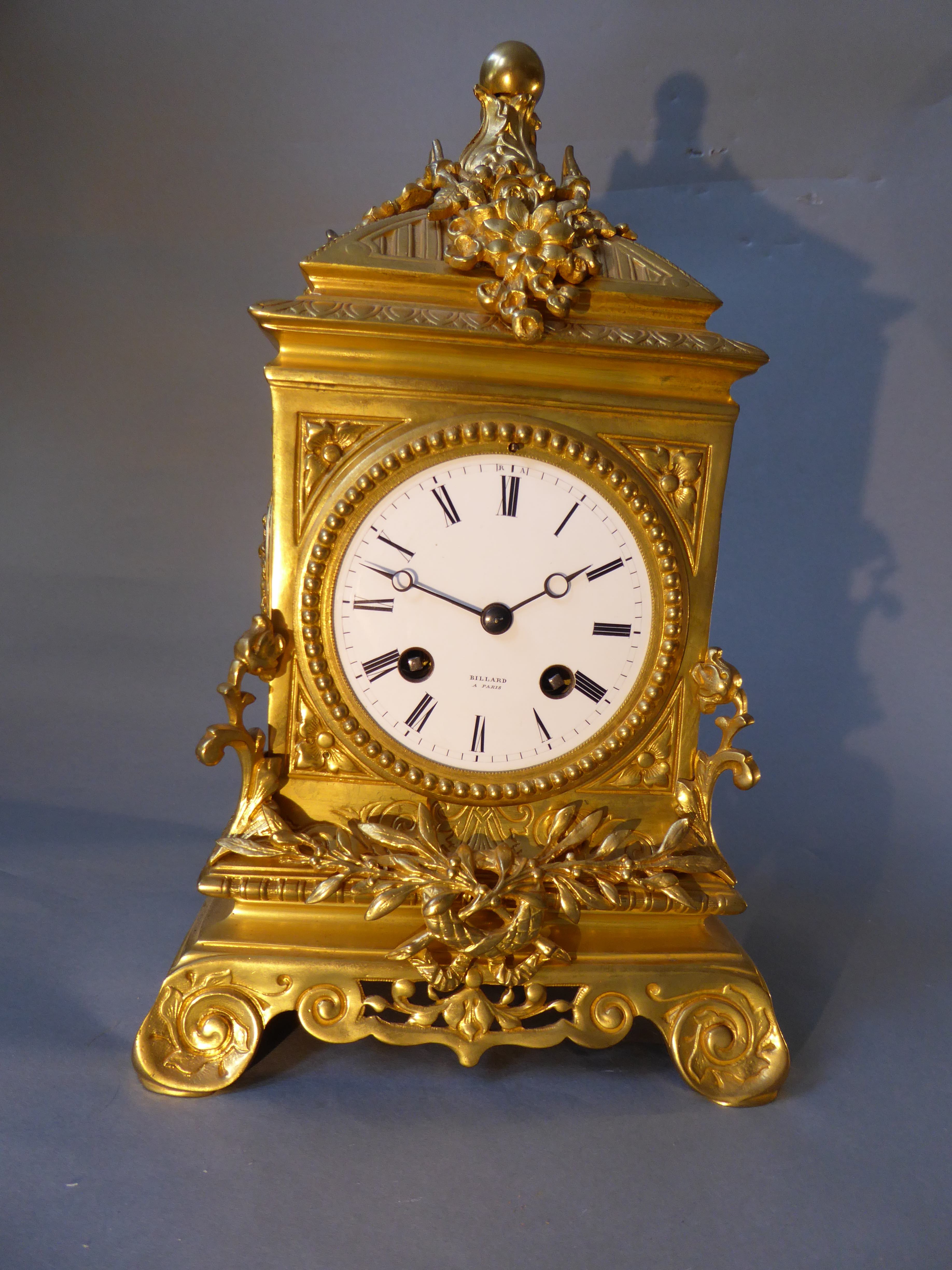 A table clock c1850, the dial signed "Billard A Paris". Gilt brass case decorated with flowers &