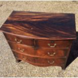 A Victorian bowfronted mahogany chest two over two graduated drawers on bracket feet